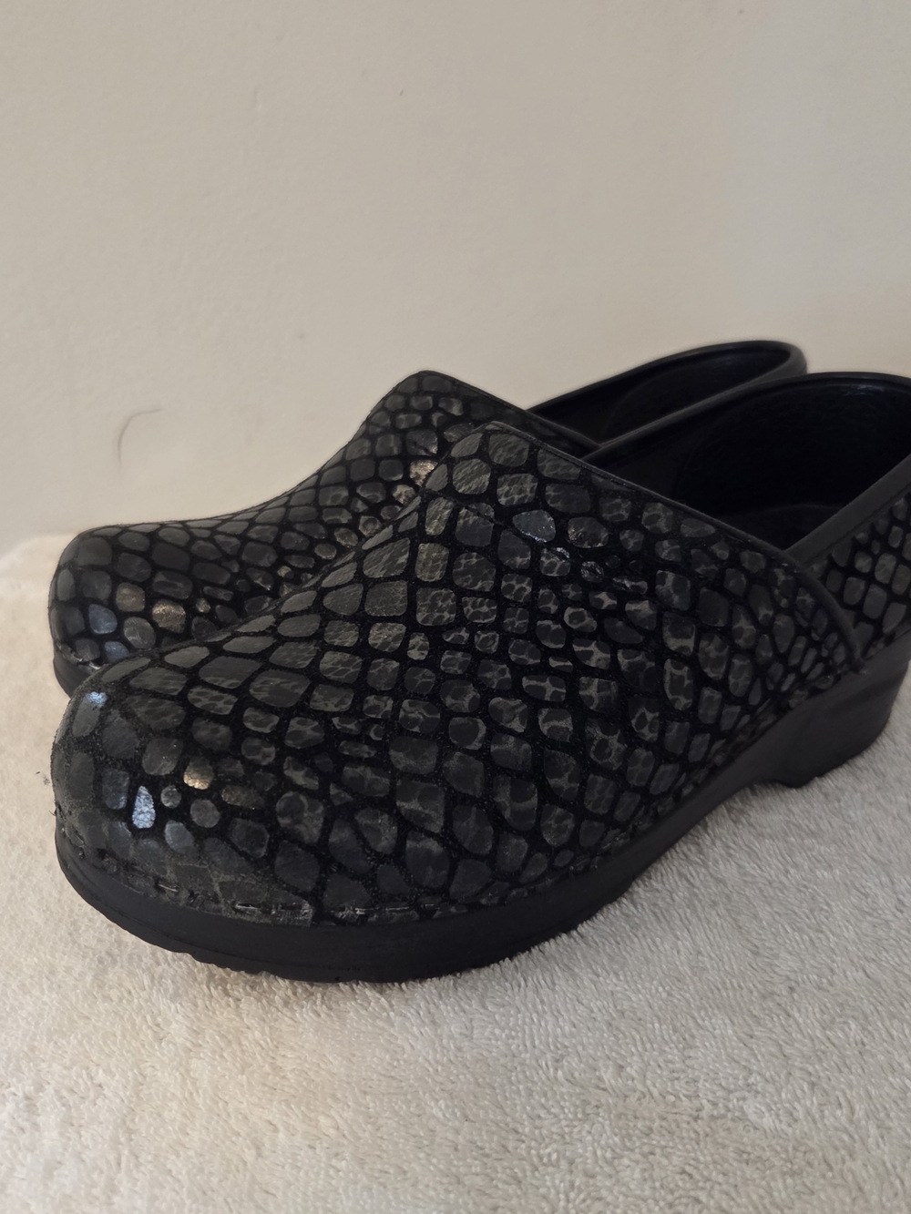 Sanita Black Faux-Snakeskin Slip-On Clogs